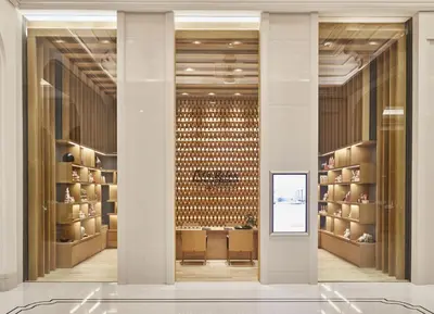 a large room with shelves of wine bottles at Grande Centre Point Sukhumvit 55 Thong Lo in Bangkok