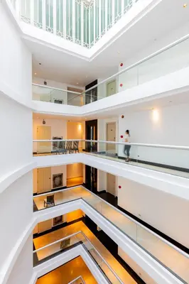 a view from the top of a building with a staircase at Sukhothai Residence Ruam Ruedi in Bangkok