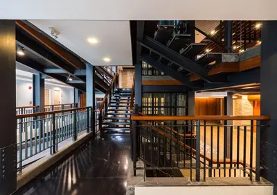 a view of a staircase in a building at Dang Derm In The Park Khaosan in Bangkok
