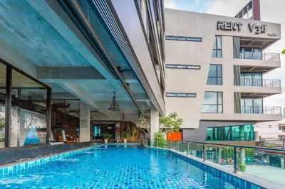 a large swimming pool in front of a building at Rent V38 #420 friendly Thailand in Bangkok