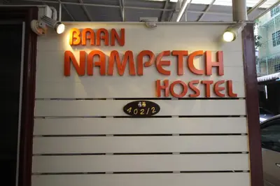 a sign for a ram narayan niwashen hospital at Baan Nampetch Hostel in Bangkok