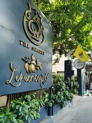 a sign for the stax lindenlords restaurant at Collection O The Spades Hostel in Bangkok