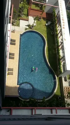 an overhead view of a swimming pool in a building at Rich Park@Tao poon interchange in Bang Su