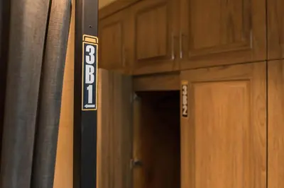 a door with a sign that says boston at Augusta in Bangkok