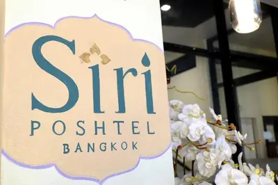 a sign for ahibitedhibited banquatown sidx sidx sidx at Siri Poshtel Bangkok in Bangkok