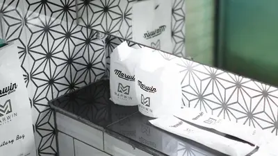 a pile of toilet paper sitting on top of a counter at Marwin Space in Bangkok