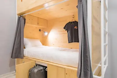 a tiny house with a bed in it at Norn Yaowarat Hotel in Bangkok