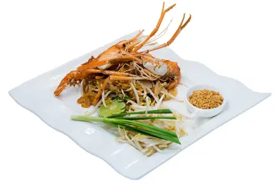 a plate of food with a lobster on it at New Siam Palace Ville Hotel in Bangkok