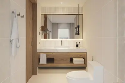 a bathroom with a sink and a toilet and a mirror at Sathorn Vista, Bangkok - Marriott Executive Apartments in Bangkok