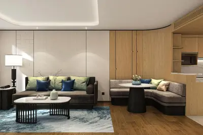 a living room with a couch and two tables at Sathorn Vista, Bangkok - Marriott Executive Apartments in Bangkok