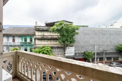 a view of a city from a balcony at Arun Sa Wad 103 NaNa in Bangkok