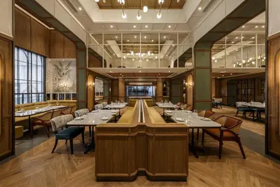 a large dining room with tables and chairs at Asia Hotel Bangkok in Bangkok