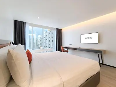 a hotel room with a bed and a window at Citichic Sukhumvit 13 by Compass Hospitality - Newly Renovated in Bangkok