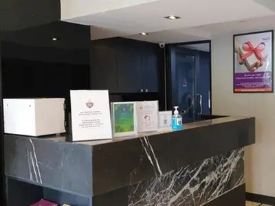 a counter in a room with signs on it at Studio Ekamai in Bangkok
