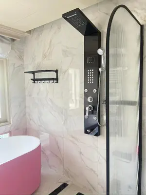 a bathroom with a shower and a sink and a tub at V20 Boutique Jacuzzi Hotel in Bangkok