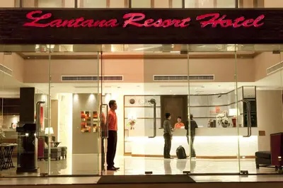 people standing in front of a store window at Lantana Resort Hotel Bangkok in Bangkok