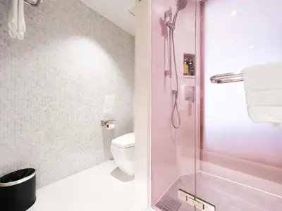 a bathroom with a shower and a toilet at Citrus Sukhumvit 13 Nana Bangkok by Compass Hospitality - Newly Renovated in Bangkok