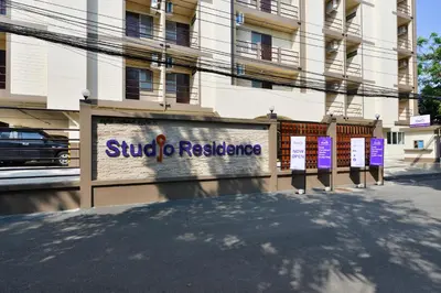 a building with a sign that reads suicide resistance at Studio Residence Sukhumvit 71 in Bangkok