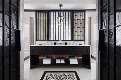 a bathroom with a large sink and a window at Bangkok Marriott Hotel The Surawongse in Bangkok