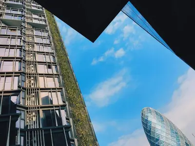 a view of a building and the gherkin from the street at BoonRumpa Accommodation in Bangkok