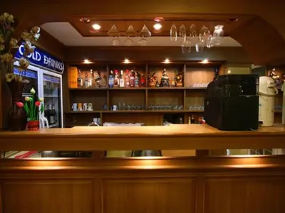 a bar in a restaurant with a counter top at Honey House 2 in Bangkok