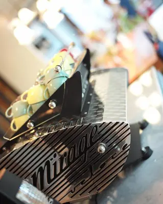 a close up of a comb on top of a table at Nandha Hotel in Bangkok
