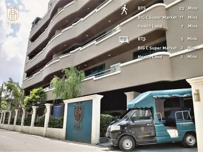 a small car parked in front of a building at THEA Private Suites by TH District in Bangkok