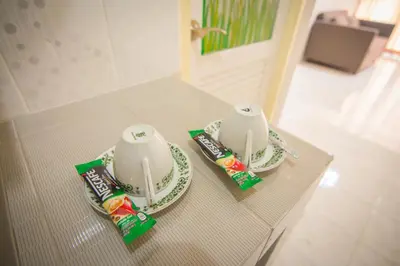 a counter with two plates and two snacks on it at Bann In Suan in Ban Lat Tanot