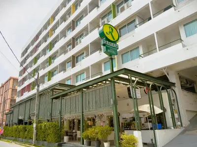 a building with a street sign in front of it at Regent Ramkhamhaeng 22 in Bangkok