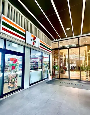 a store front with glass doors in a mall at The Quarter Ladprao by UHG in Bangkok
