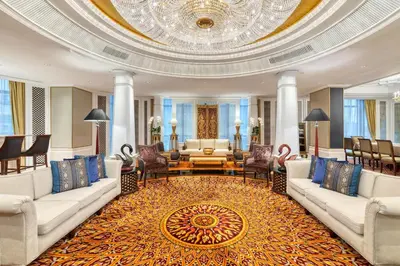 a lobby with couches and a living room at The Athenee Hotel, a Luxury Collection Hotel, Bangkok in Bangkok