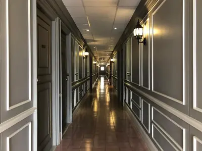 a hallway of a building with a long corridor at M. Swita เอ็ม.สวิต in Bangkok