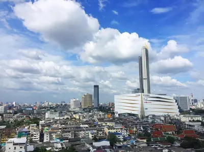 a view of a city with buildings and clouds at King Royal 2 in Bangkok