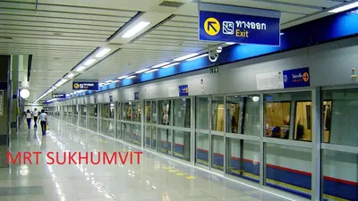 a hallway of a subway station with people walking through it at W 21 Hotel Bangkok in Bangkok