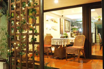 a dining room with a table and chairs at Baan Sukhumvit Soi 20 in Bangkok