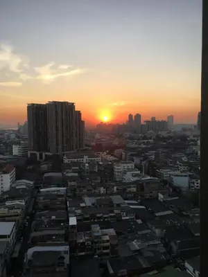a view of a city with the sunset in the background at Bangkok view,Luxurious 1 Bedroom Sathon in Bangkok