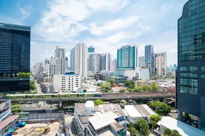 a view of a city skyline with tall buildings at Hotel Mermaid Bangkok in Bangkok