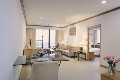 a room with a living room and a bedroom at Riverine Place Hotel and Residence in Nonthaburi
