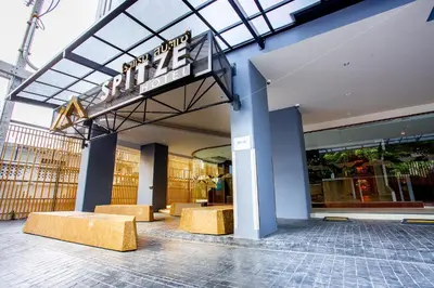 a store front with a sign on top of it at Spittze Hotel Pratunam in Bangkok