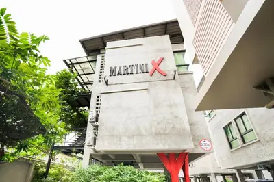 a building with a marmite sign on the side of it at Matini Ratchada 32 in Bangkok