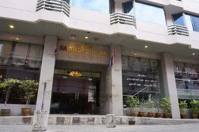 a large building with a sign on the front of it at Bangkok City Inn in Bangkok