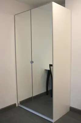 a glass door in a room with a table at V One Pride-Sukhumvit 22, Bangkok in Bangkok