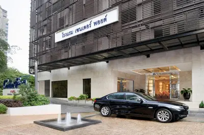 a black car parked in front of a building at Centre Point Hotel Chidlom Bangkok in Bangkok