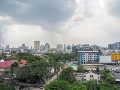 a cityscape of a city with buildings and trees at Casa Luxe Hotel and Resident in Bangkok