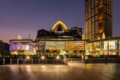 a view of a city at night with buildings at Atnest Hostel in Bangkok