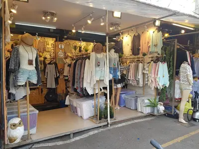 a clothing store with a lot of clothes on display at Chatuchak Art & Nature House ( 3-6 pers.) in Bangkok