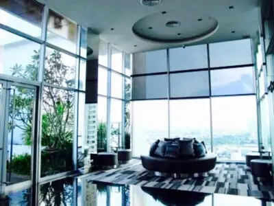 a large room with a large floor to ceiling windows at Luxury Apartment near Downtown (Pick-up Service) in Bangkok