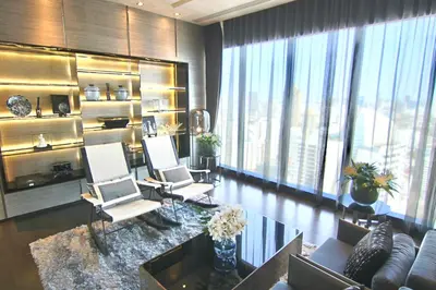 a living room with two chairs and a table at Luxurious & Romantic in the Heart of BKK. MRT/BTS! in Bangkok