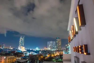 a view of a city skyline at night at U Sabai Hotel Bangkok in Bangkok
