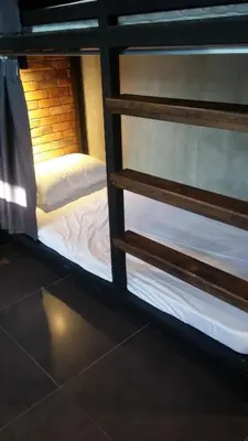 a pair of bunk beds in a room at bangkok bed place in Bangkok